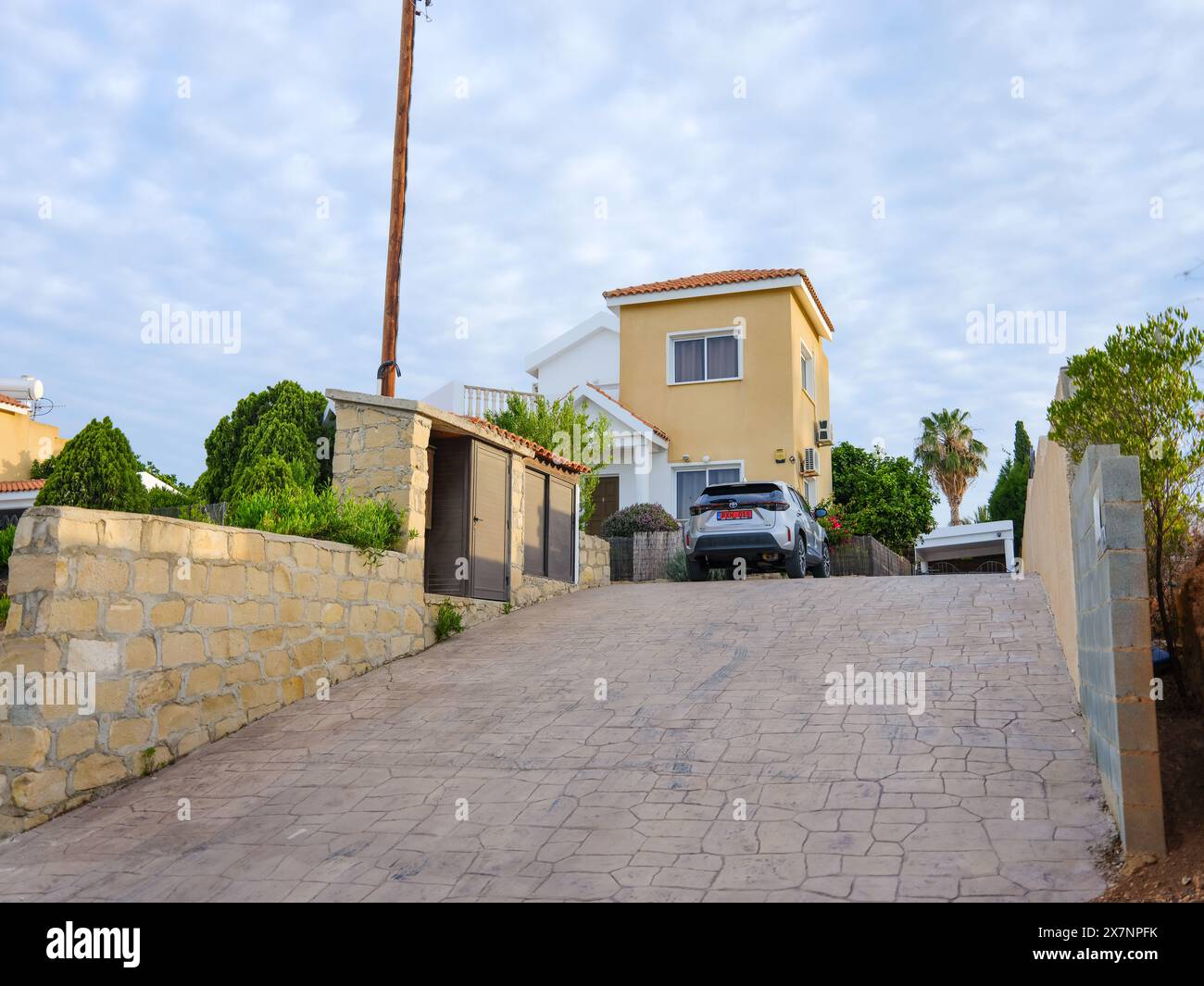 May 2024, Steep driveway to a villa home in Pegeia, Pafos, Cyprus. Stock Photo