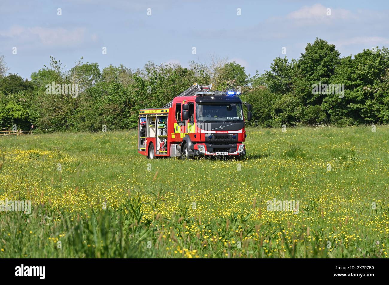 Fire engine in a field adjacent to Hook Norton Brewery in attendance at