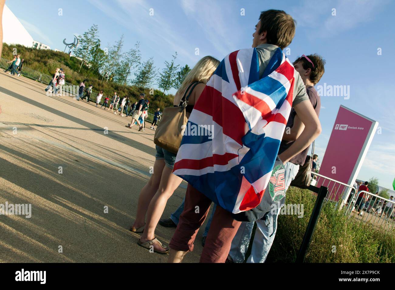 Sports Fan, draped in the British Flag, in the Queen Elizabeth Olympic Park, during the 2012 London Paralympic Games, Stratford. Stock Photo
