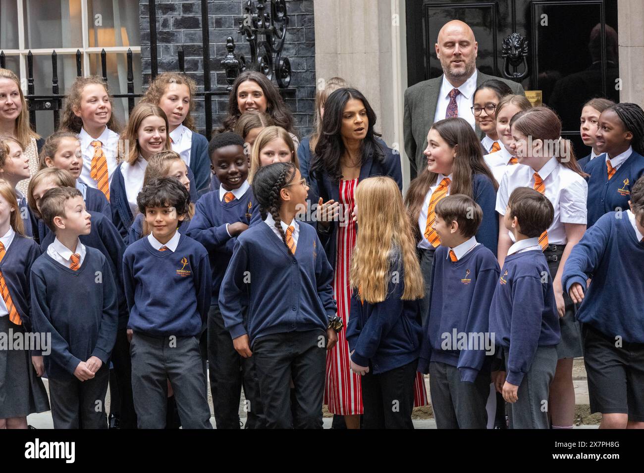 London, UK. 21st May, 2024. D Day commemorations in Downing Street London UK Prime Minister's wife Akshata Murty greets a school party for the commemoration Credit: Ian Davidson/Alamy Live News Stock Photo