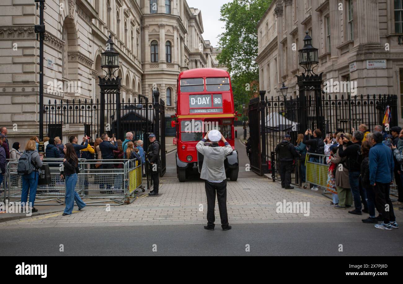 London, England, UK. 21st May, 2024. A 1950's AEC Regent III double decker bus of the London Bus Company is seen leaving Downing Street in London, to take schoolchildren attending a D-Day history lesson at number 10, to meet veterans on board HMS Belfast on the River Thames. (Credit Image: © Tayfun Salci/ZUMA Press Wire) EDITORIAL USAGE ONLY! Not for Commercial USAGE! Credit: ZUMA Press, Inc./Alamy Live News Stock Photo