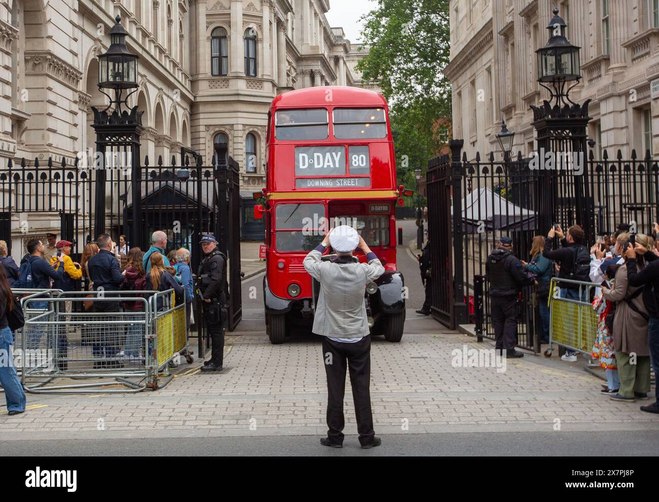 London, England, UK. 21st May, 2024. A 1950's AEC Regent III double decker bus of the London Bus Company is seen leaving Downing Street in London, to take schoolchildren attending a D-Day history lesson at number 10, to meet veterans on board HMS Belfast on the River Thames. (Credit Image: © Tayfun Salci/ZUMA Press Wire) EDITORIAL USAGE ONLY! Not for Commercial USAGE! Credit: ZUMA Press, Inc./Alamy Live News Stock Photo