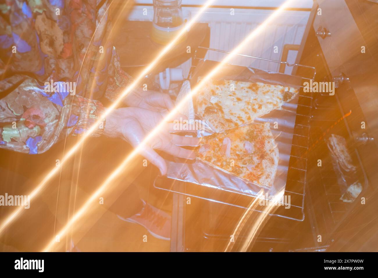 Pizza during a birthday party for a group of young adults in the De Pijpe district of Amsterdam, capital of the Netherlands in Europe on 27 November 2 Stock Photo