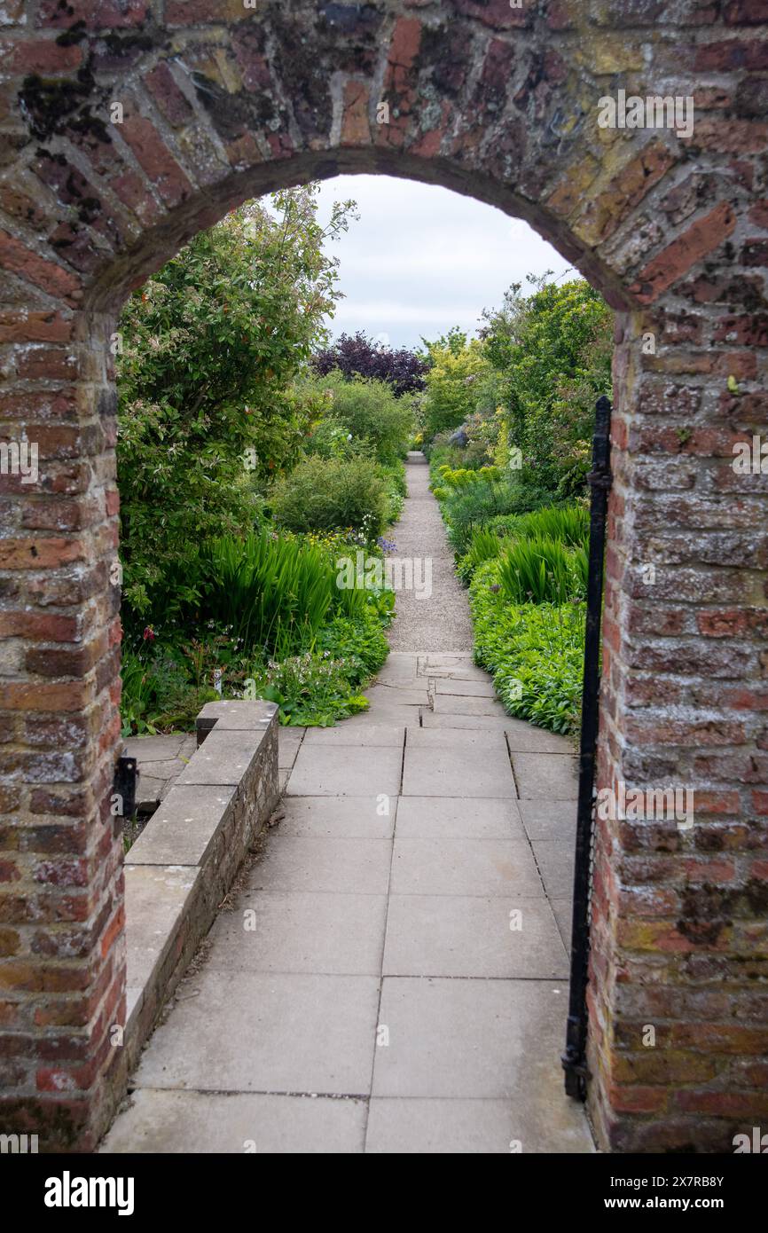 Old brick garden boundary wall hi-res stock photography and images - Alamy