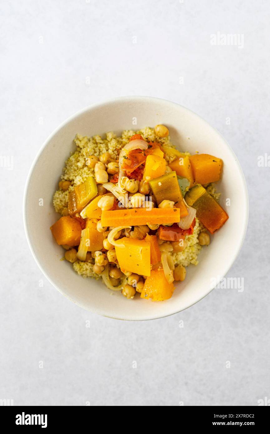 Vegetable cous cous with carrots, pumpkin, tomato, bell pepper and ...