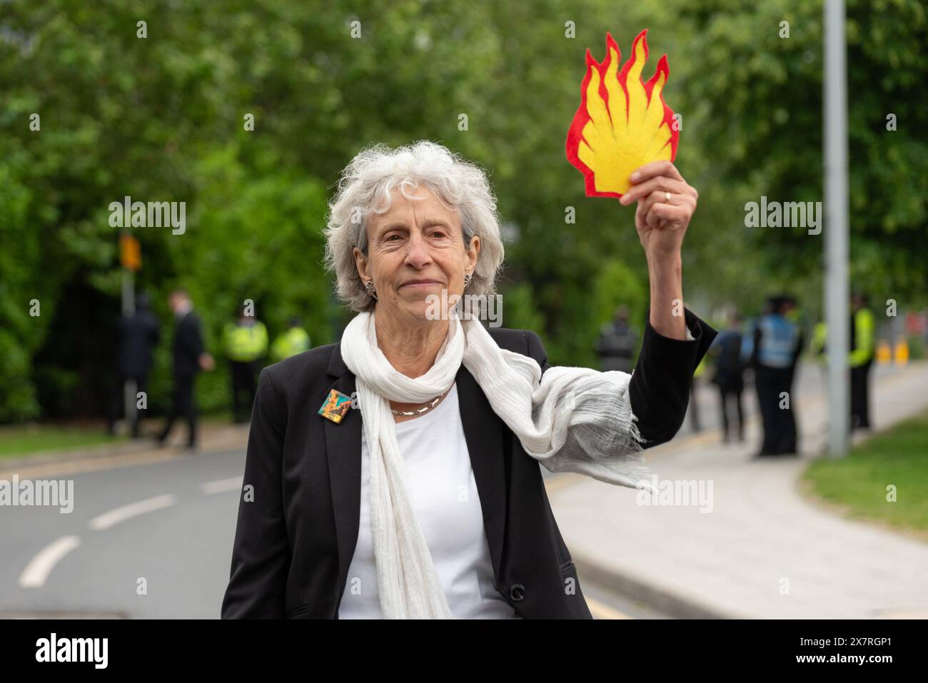 London, UK. 21 May 2024. Fossil Free London disrupts Shell’s AGM at the InterContinental O2. While some protesters are gathered holding banners and chanting others are being carried by security out of the venue. Credit: Andrea Domeniconi/Alamy Live News Stock Photo