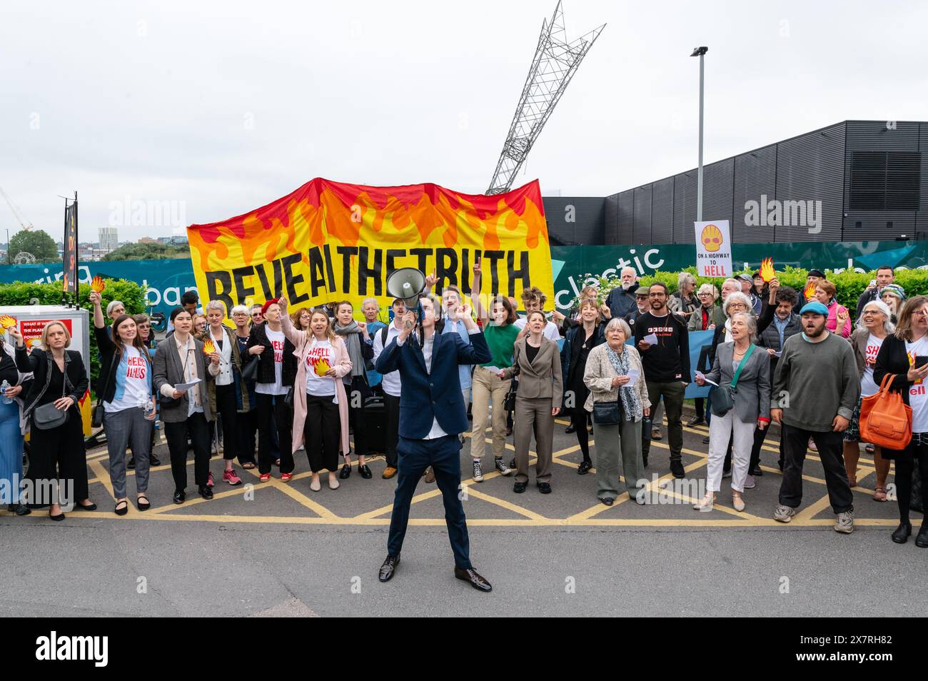 London, UK. 21 May 2024. Fossil Free London disrupts Shell’s AGM at the InterContinental O2. While some protesters are gathered holding banners and chanting others are being carried by security out of the venue. Credit: Andrea Domeniconi/Alamy Live News Stock Photo