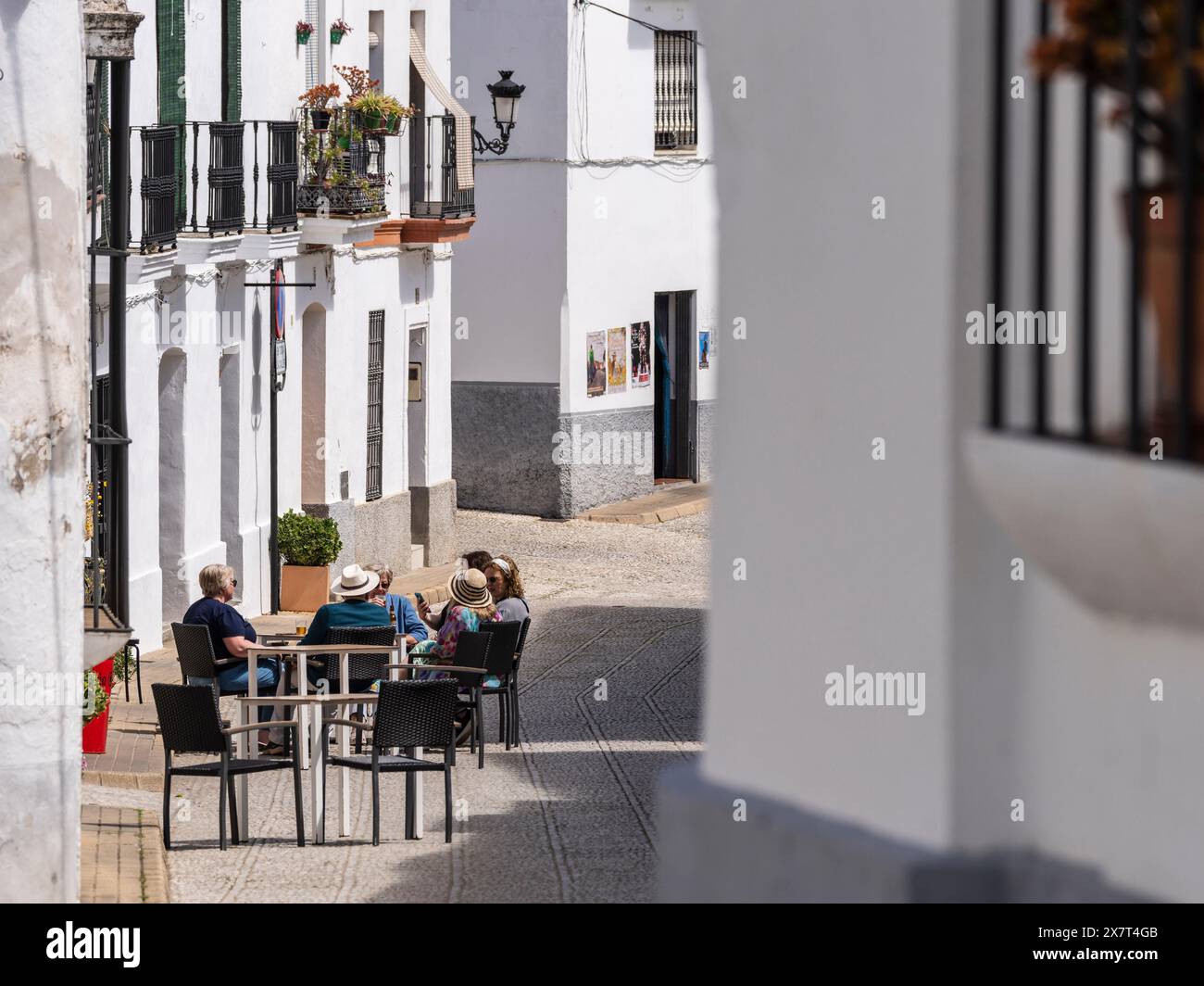 tourists on a bar terrace, Almonaster la Real , Huelva, Andalusia, Spain Stock Photo