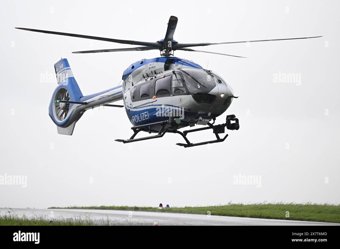21 May 2024, Baden-Württemberg, Filderstadt: A police helicopter ...