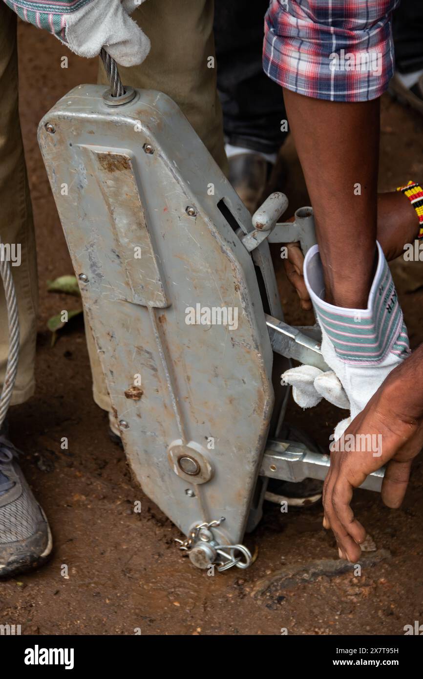 Recovery equipment for unstacking 4x4 vehicle out of muddy road, sand plates, mechanical winch, pooling ropes, high lift jack, shovel Stock Photo