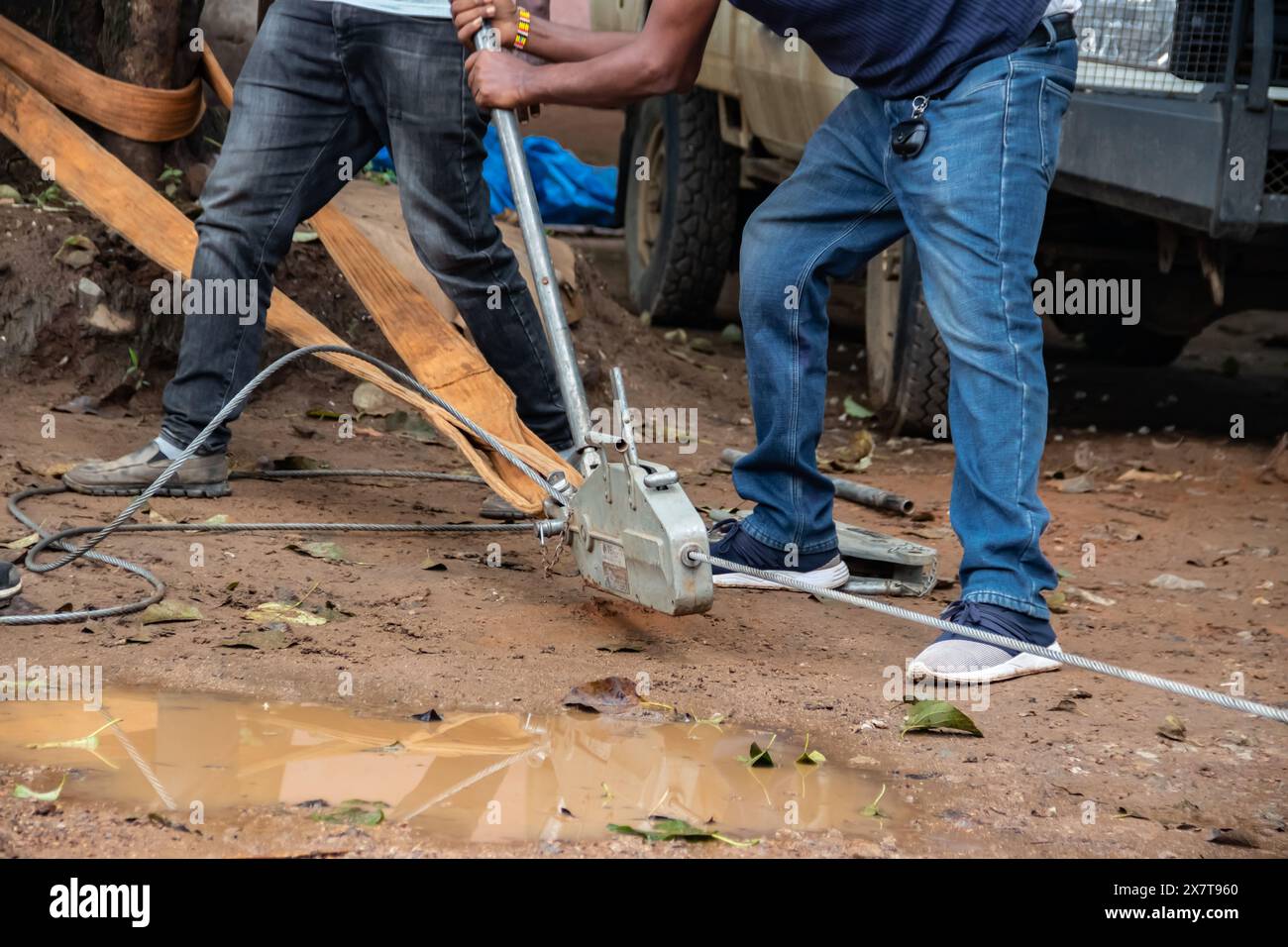 Recovery equipment for unstacking 4x4 vehicle out of muddy road, sand plates, mechanical winch, ropes, high lift jack, shovel, safety equiopment Stock Photo