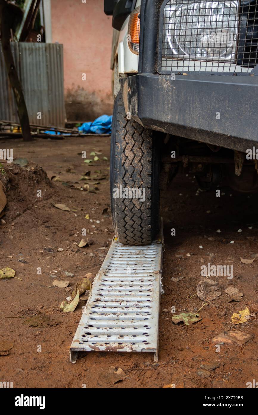 Recovery equipment for unstacking 4x4 vehicle out of muddy road, sand plates, mechanical winch, pooling ropes, high lift jack, shovel Stock Photo