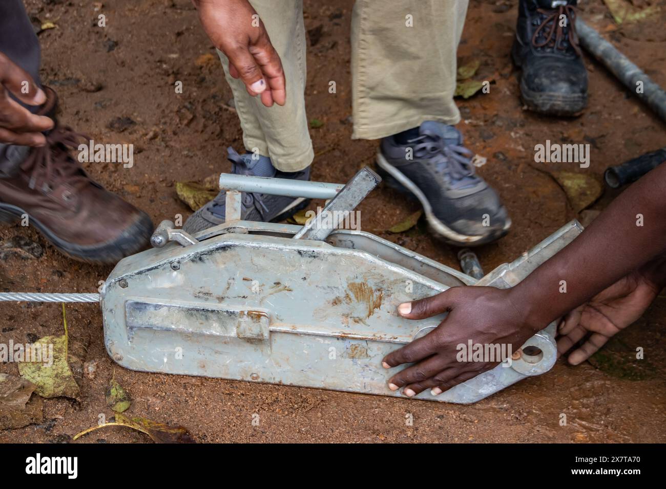 Recovery equipment for unstacking 4x4 vehicle out of muddy road, sand plates, mechanical winch, ropes, high lift jack, shovel, safety equiopment Stock Photo