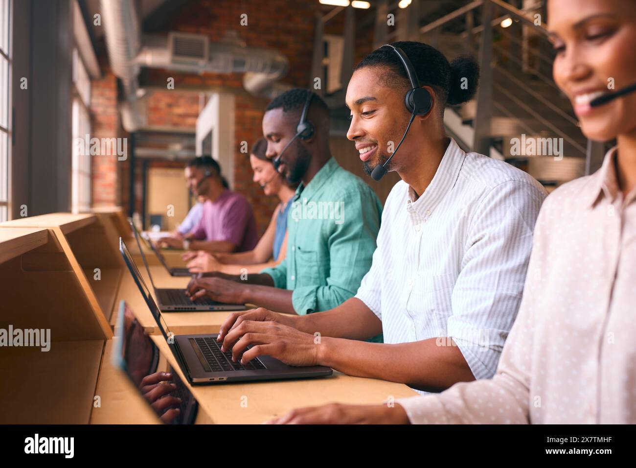 Multi-Cultural Customer Support Or Telesales Team In Modern Open Plan ...