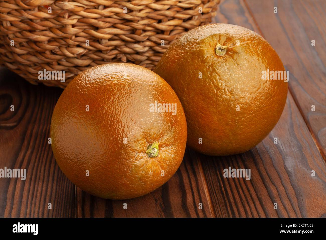 chocolate oranges on wood background Stock Photo