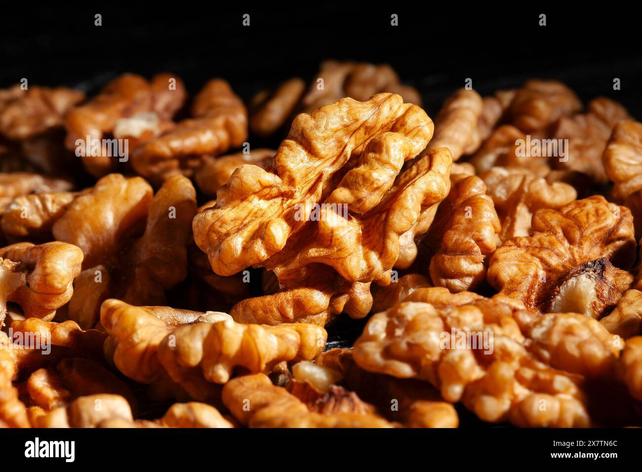 walnuts macro on black background Stock Photo