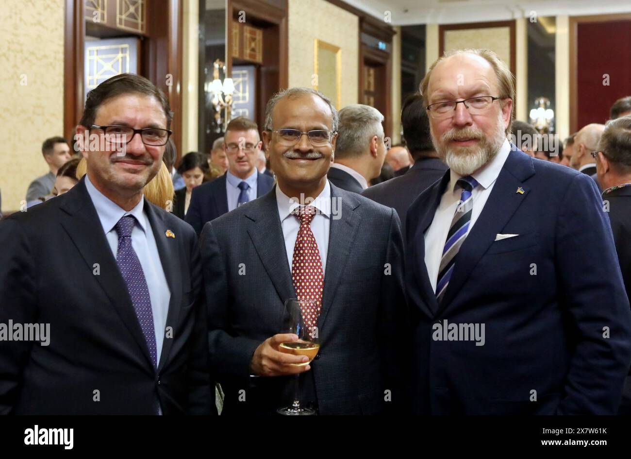KYIV, UKRAINE - MAY 20, 2024 - Ambassador Extraordinary and Plenipotentiary of the Kingdom of Spain to Ukraine Ricardo Lopez-Aranda Jagu, Ambassador Extraordinary and Plenipotentiary of the Republic of India to Ukraine Harsh Kumar Jain and President of the Ukrainian Chamber of Commerce and Industry Gennadiy Chyzhykov (L to R) attend the reception to honour heroism and freedom held by the Israeli Embassy to celebrate the 76th anniversary of the establishment of the State of Israel, Kyiv, capital of Ukraine. Stock Photo