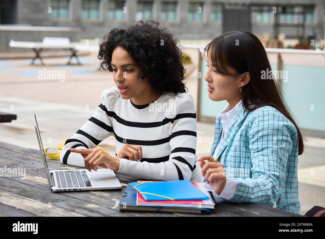 Multiethnic students studying at University campus Stock Photo