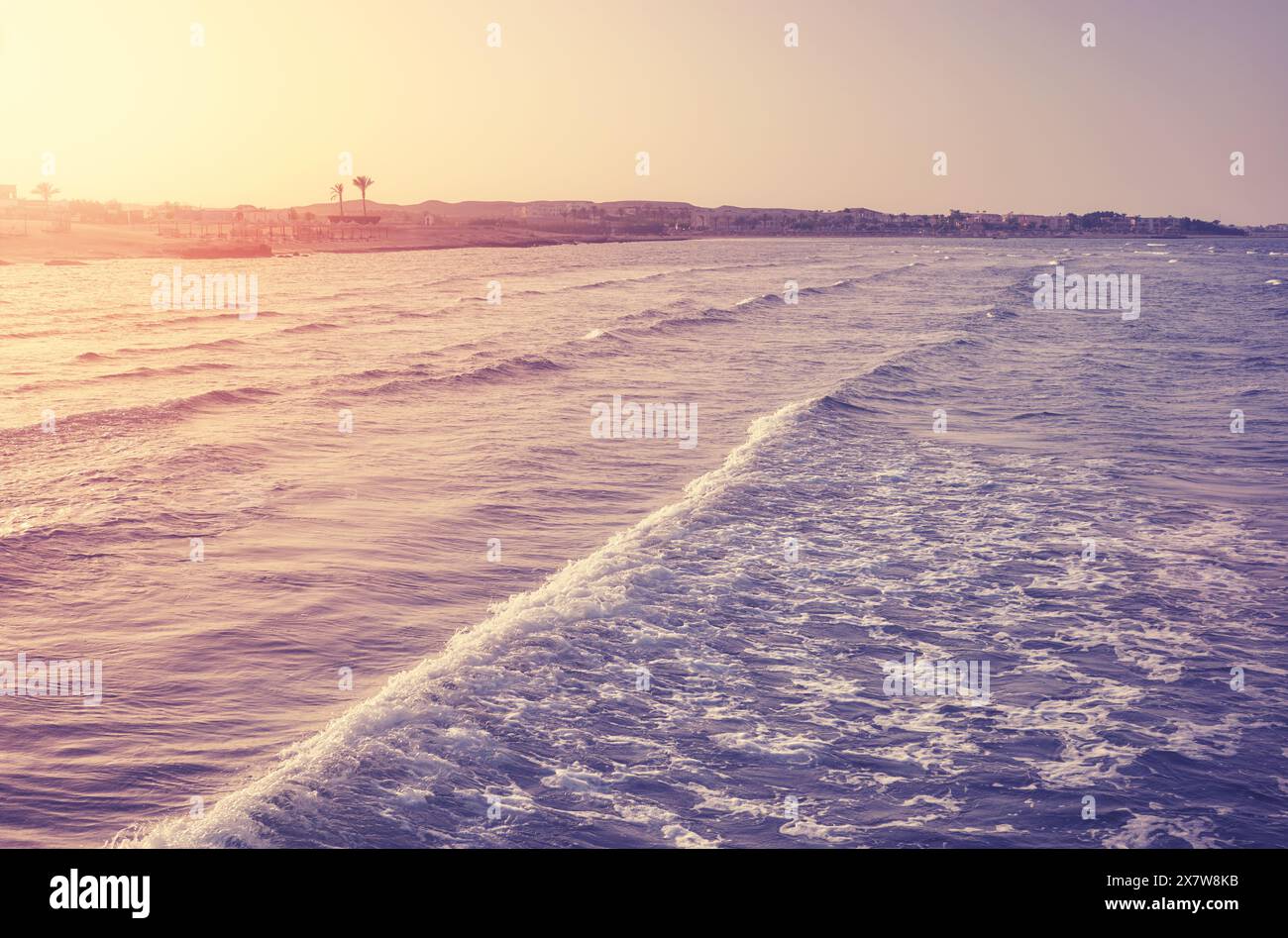 Seascape seen from above the water at sunset, retro color toning applied, Egypt. Stock Photo