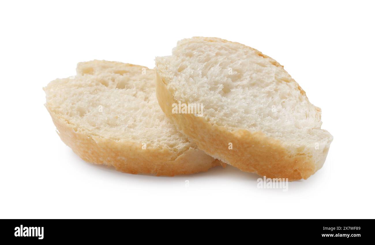 Pieces of fresh baguette isolated on white Stock Photo - Alamy