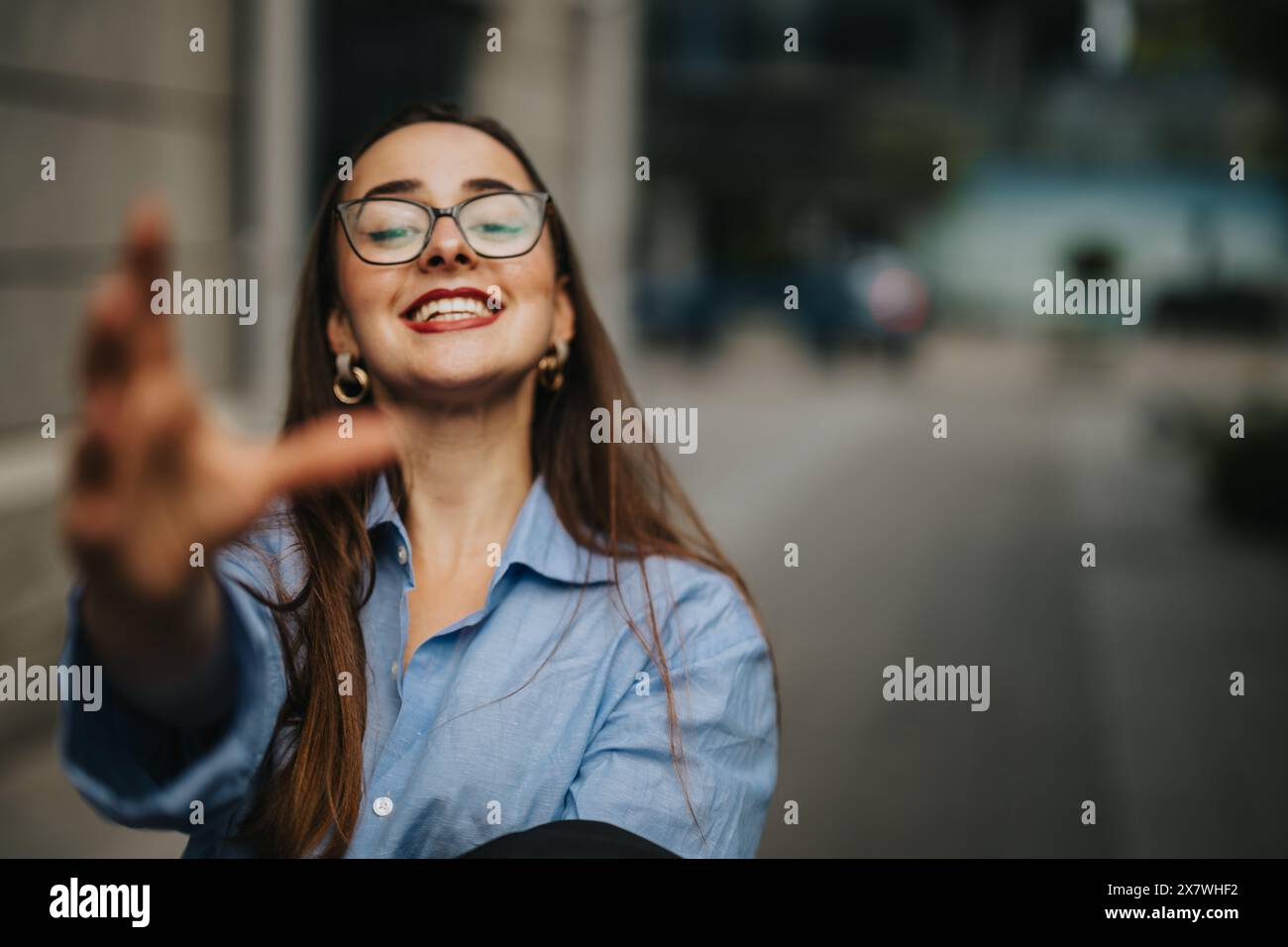 Woman reaching out her hand hi-res stock photography and images - Alamy