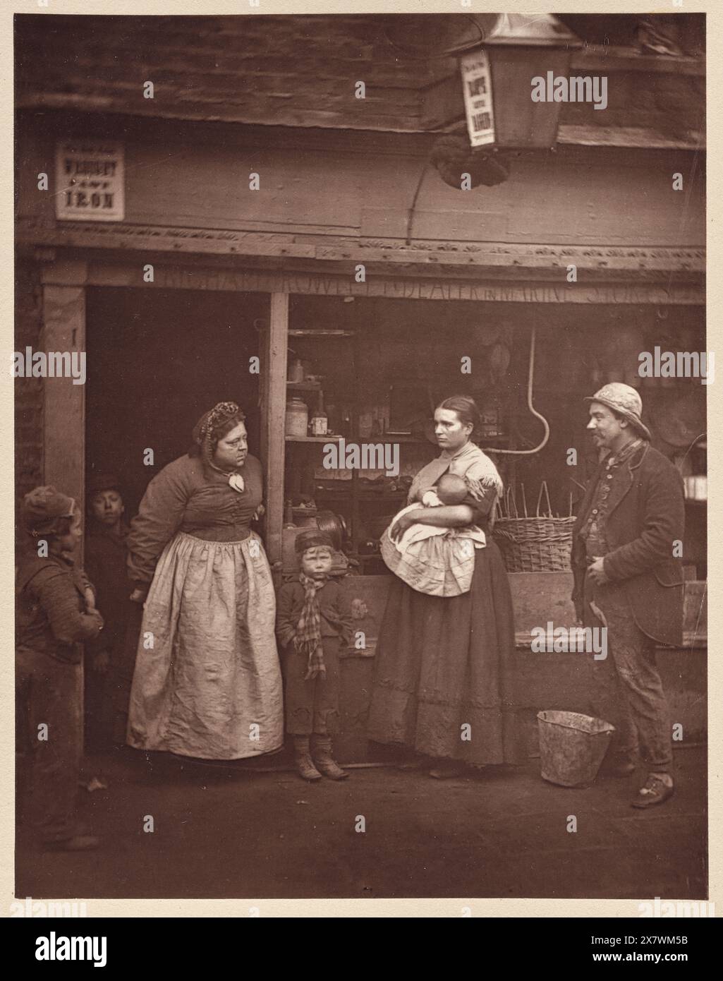 Sufferers from the Floods.  Vintage London Street Photography, late 19th century, by John Thomson, 1877 Stock Photo