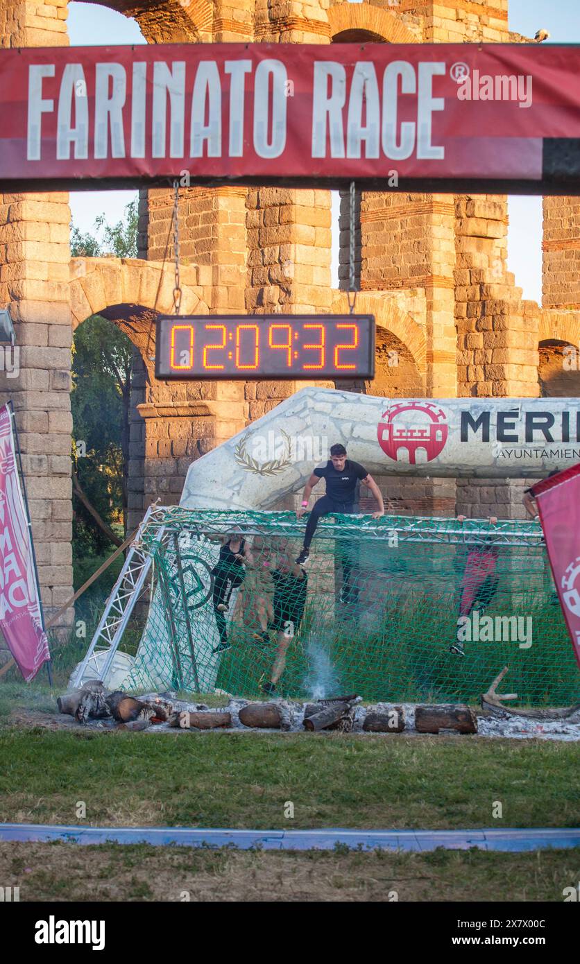 Merida, Spain - May 18th, 2024: FarinatoRace Merida 2024. Finish line with a burning log Stock Photo