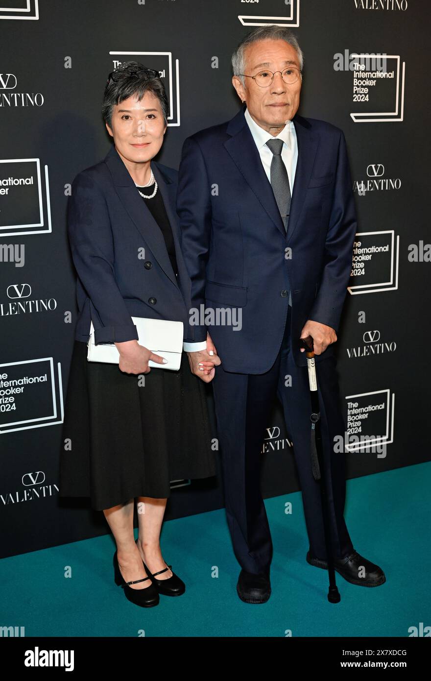 LONDON, ENGLAND - MAY 21 2024: Author Hwang Sok-yong (R) and guest with the shortlisted book 'Mater 2-10' attends The International Booker Prize 2024 announcement at Tate Modern in London, England. Credit: See Li/Picture Capital/Alamy Live News Stock Photo