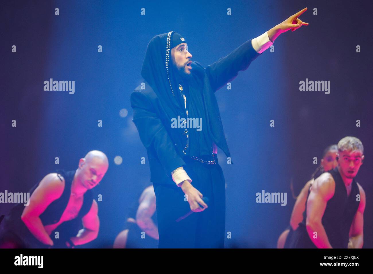 Tampa, Florida, USA. 21st May, 2024. Bad Bunny points towards the crowd, while he performs with his dance crew during the Most Wanted Tour at Raymond James Stadium on Tuesday, May 21, 2024, in Tampa. (Credit Image: © Jefferee Woo/Tampa Bay Times via ZUMA Press Wire) EDITORIAL USAGE ONLY! Not for Commercial USAGE! Stock Photo