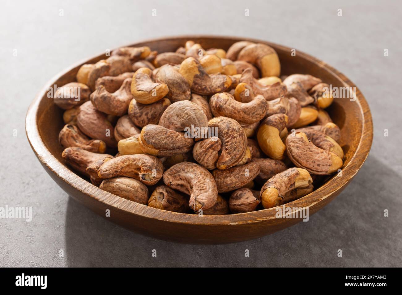 Roasted cashew nuts with shells stock photo alamy