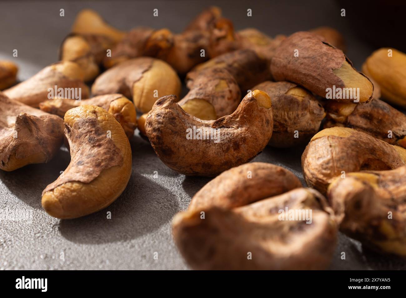 Roasted cashew nuts with shells stock photo alamy
