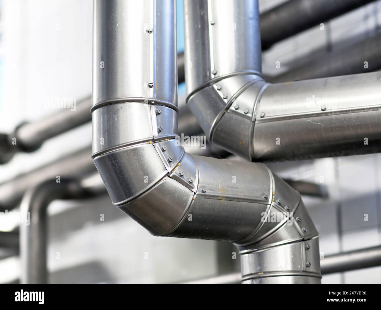metal pipes and tubes in an industrial plant Stock Photo