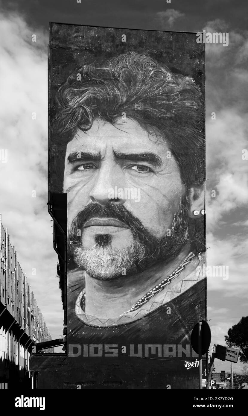 Street artist Jorit's mural of Maradona on a building in Naples, Italy