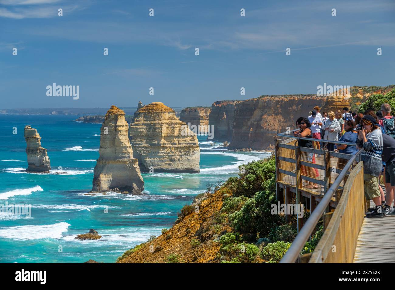 Sightseers and tourists at the 'Twelve Apostles' limestone sea stacks at Port Campbell National Park on the Great Ocean Road in Victoria, Australia. Stock Photo