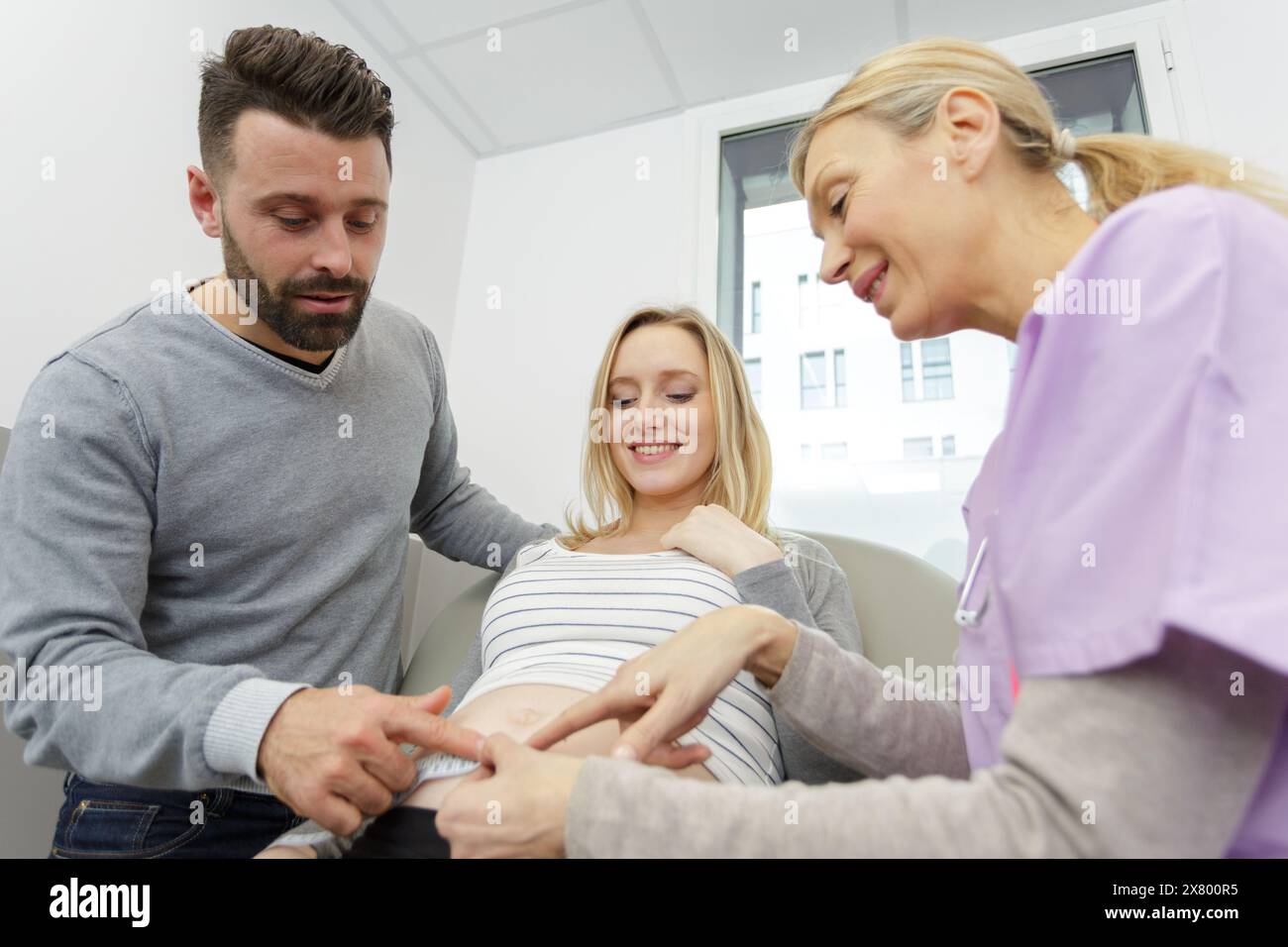 couple in consultation at ivf clinic talking to doctor Stock Photo - Alamy