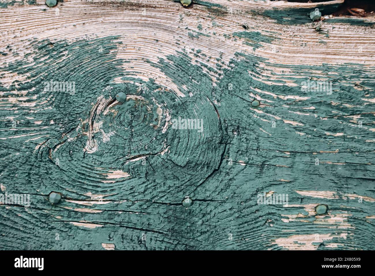 Old wooden surface with peeling paint Stock Photo