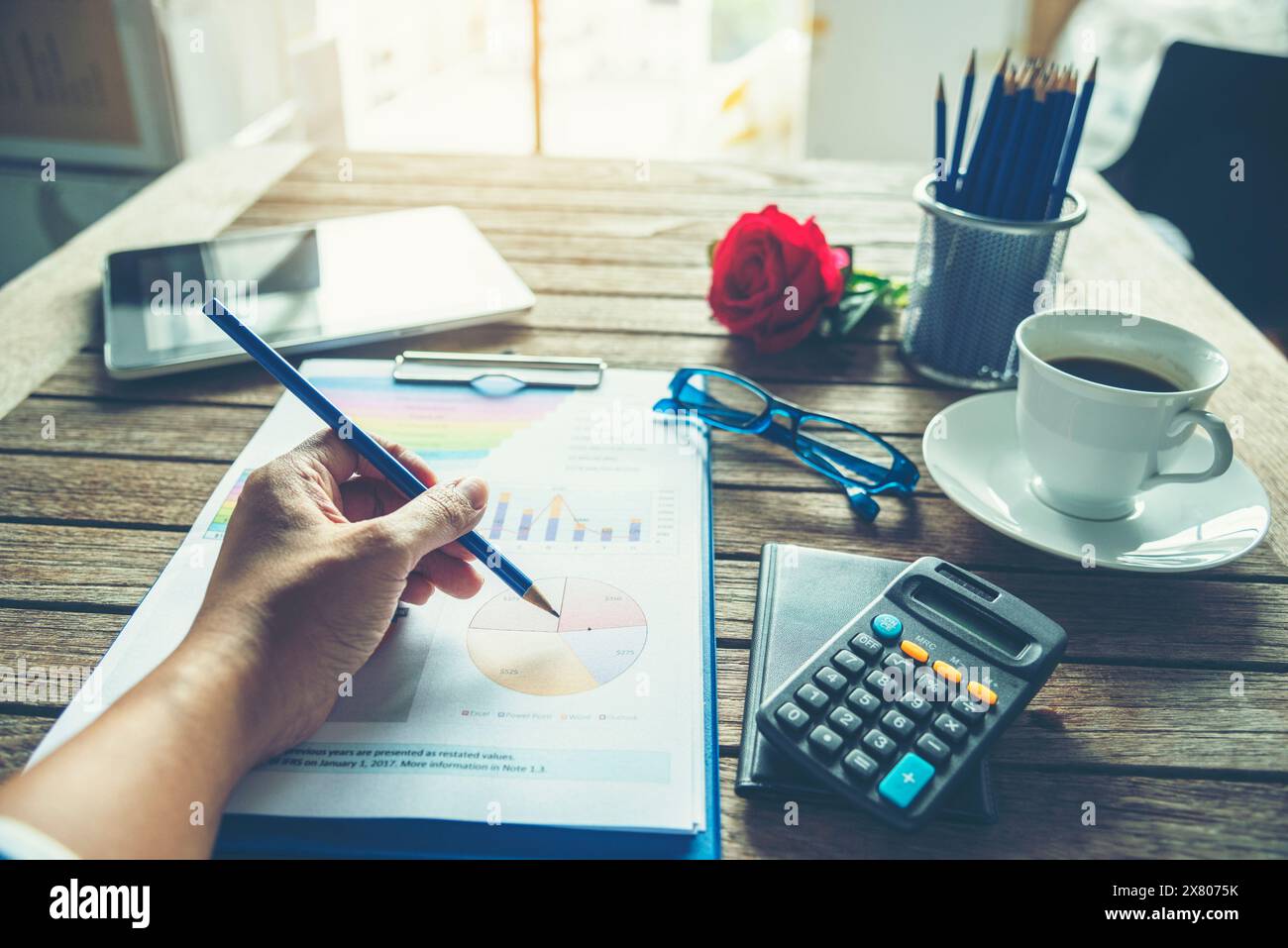 Excel graph with spreadsheet document showing information financial