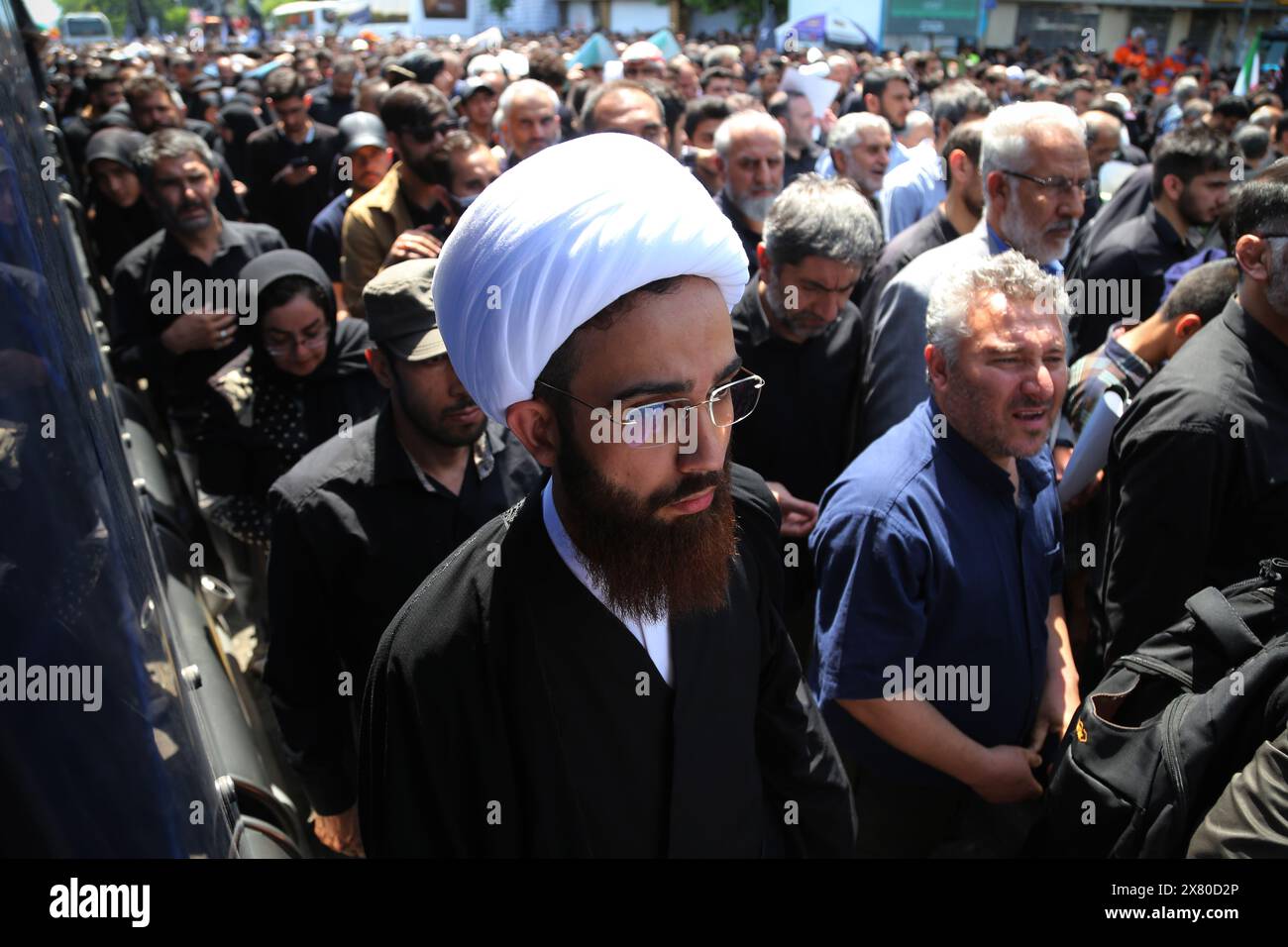 Tehran, Iran. Tehran, Iran. 22nd May, 2024. An Iranian Shia cleric man walks during a funeral ceremony for the late President Ebrahim Raisi and his companions, who were killed during a helicopter crash in a mountainous region of the country's northwest in Tehran. Credit: ZUMA Press, Inc./Alamy Live News Stock Photo
