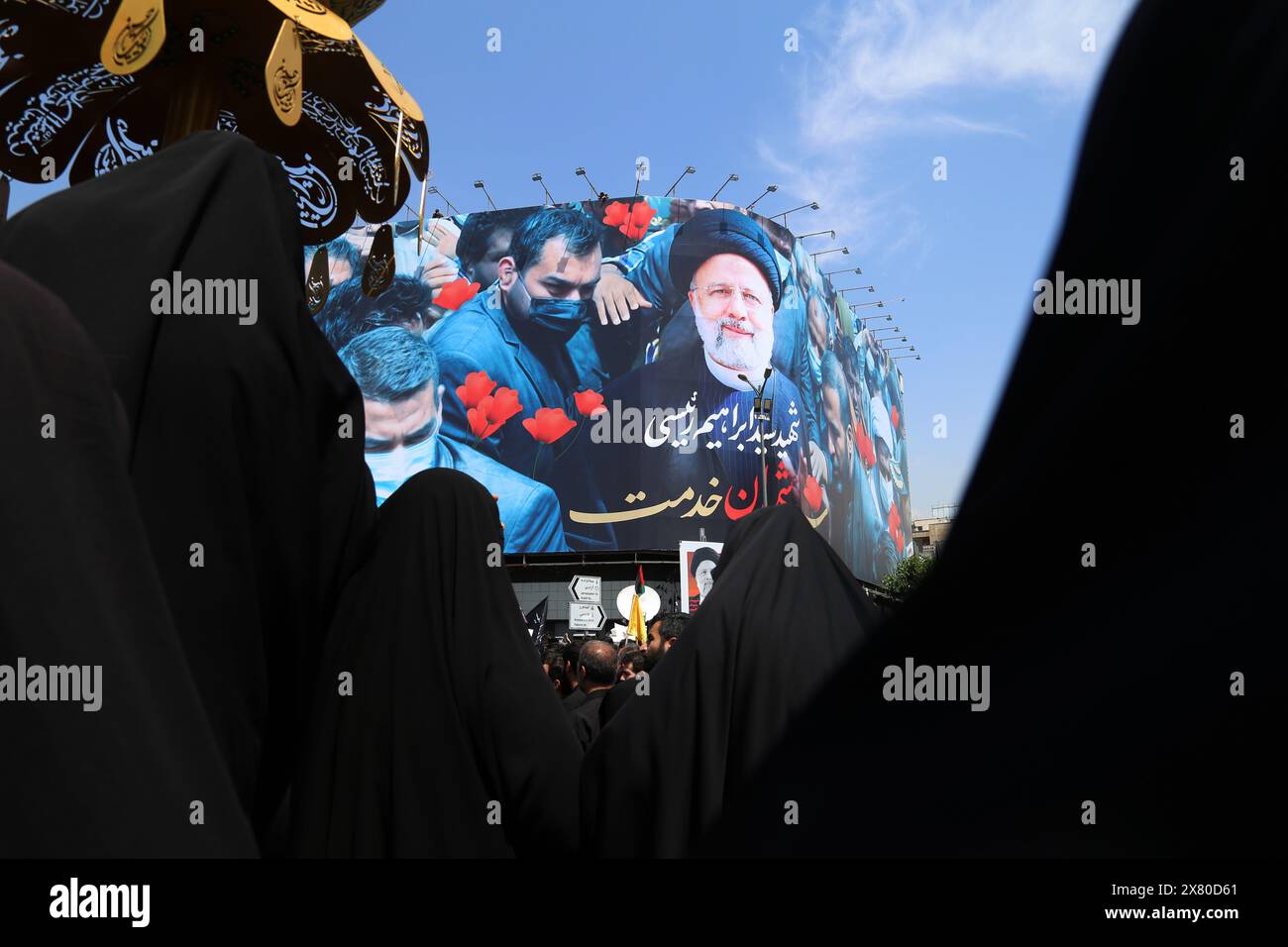 Tehran, Iran. Tehran, Iran. 22nd May, 2024. Iranian veiled women attend a funeral ceremony for the late President Ebrahim Raisi and his companions who were killed during a helicopter crash on Sunday in a mountainous region of the country's northwest, in Tehran. Credit: ZUMA Press, Inc./Alamy Live News Stock Photo