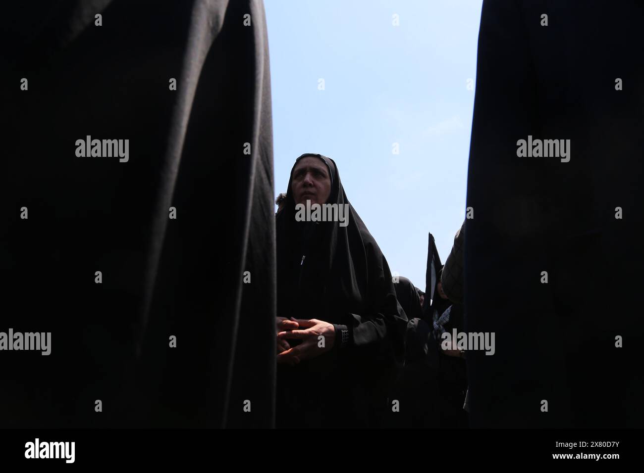 Tehran, Iran. Tehran, Iran. 22nd May, 2024. An Iranian veiled woman attends a funeral ceremony for the late President Ebrahim Raisi and his companions who were killed during a helicopter crash on Sunday in a mountainous region of the country's northwest, in Tehran. Credit: ZUMA Press, Inc./Alamy Live News Stock Photo