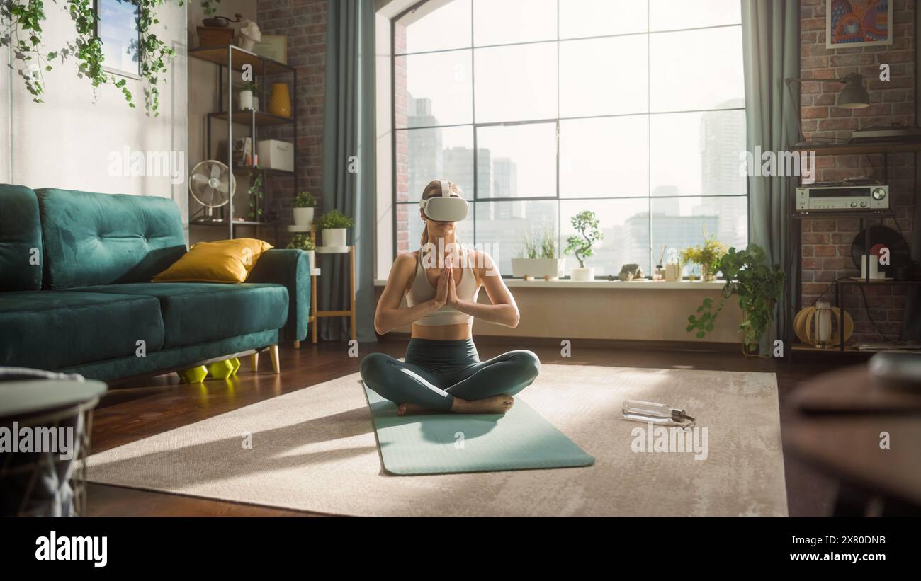 Young Fit Female Wearing Virtual Reality Headset, Practising Meditation ...