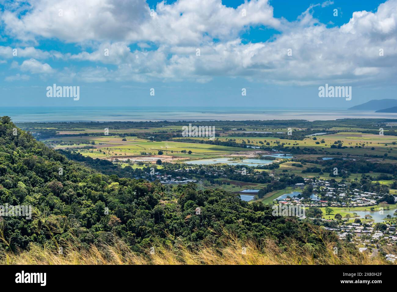 Looking down the Barron Gorge towards Caravonica, farmlands and the Cairns coast line in north Queensland, Australia Stock Photo