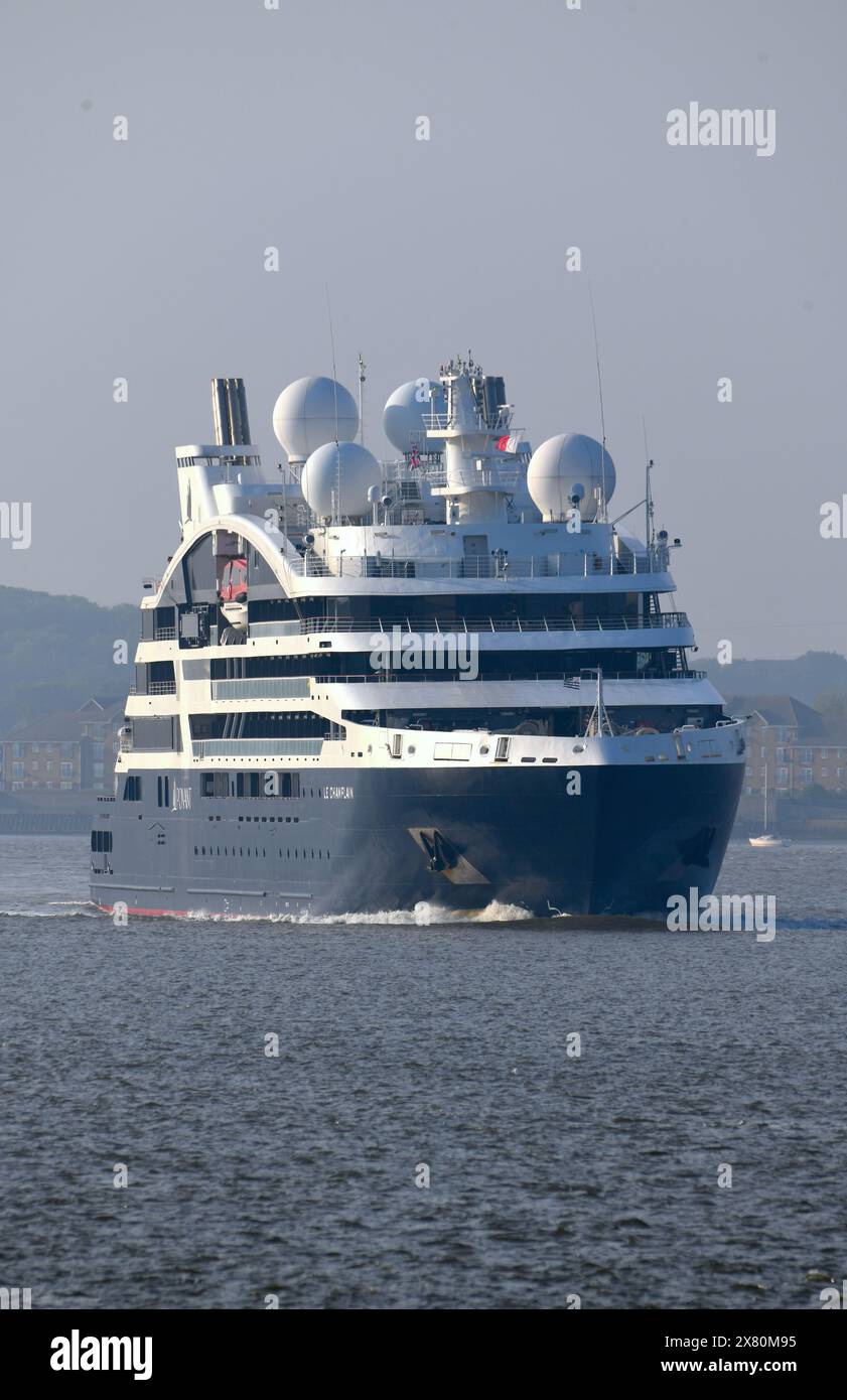 The ultra luxury cruise ship Le Champlain cruising the Thames near Gravesend in Kent after a visit to London. The cruise ship is operated by Ponant an Stock Photo