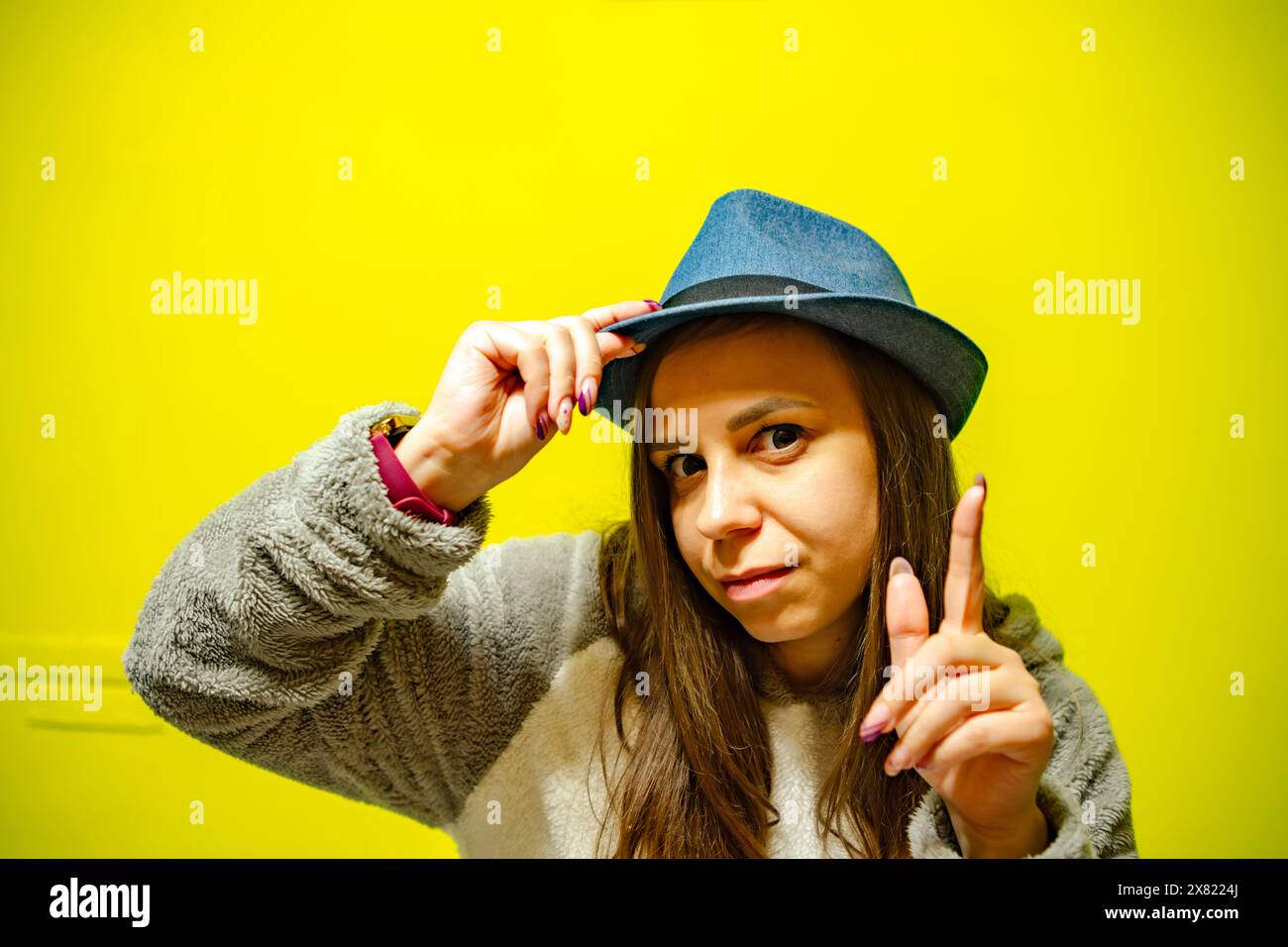 Woman performer in black hat hi-res stock photography and images - Alamy