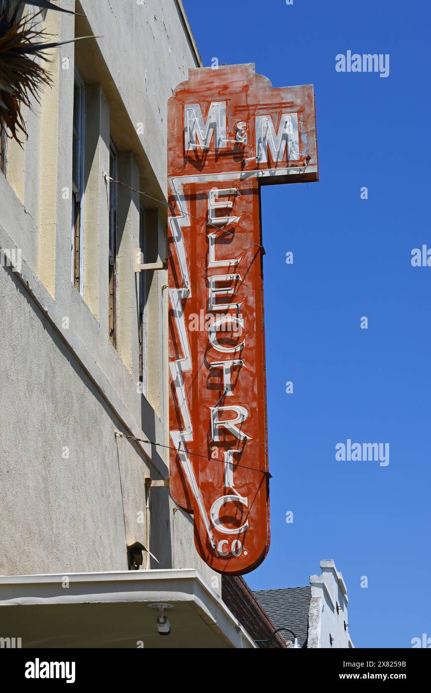 POMONA, CALIFORNIA 18 MAY 2024 M and M Electric Co. sign in historic downtown Pomona Stock