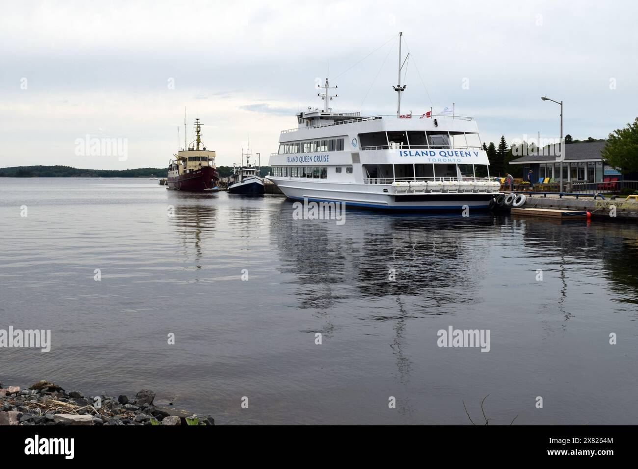 Moored Ships at Jetty on Parry Sound Harbour, Georgian Bay, Ontario, Canada Stock Photo