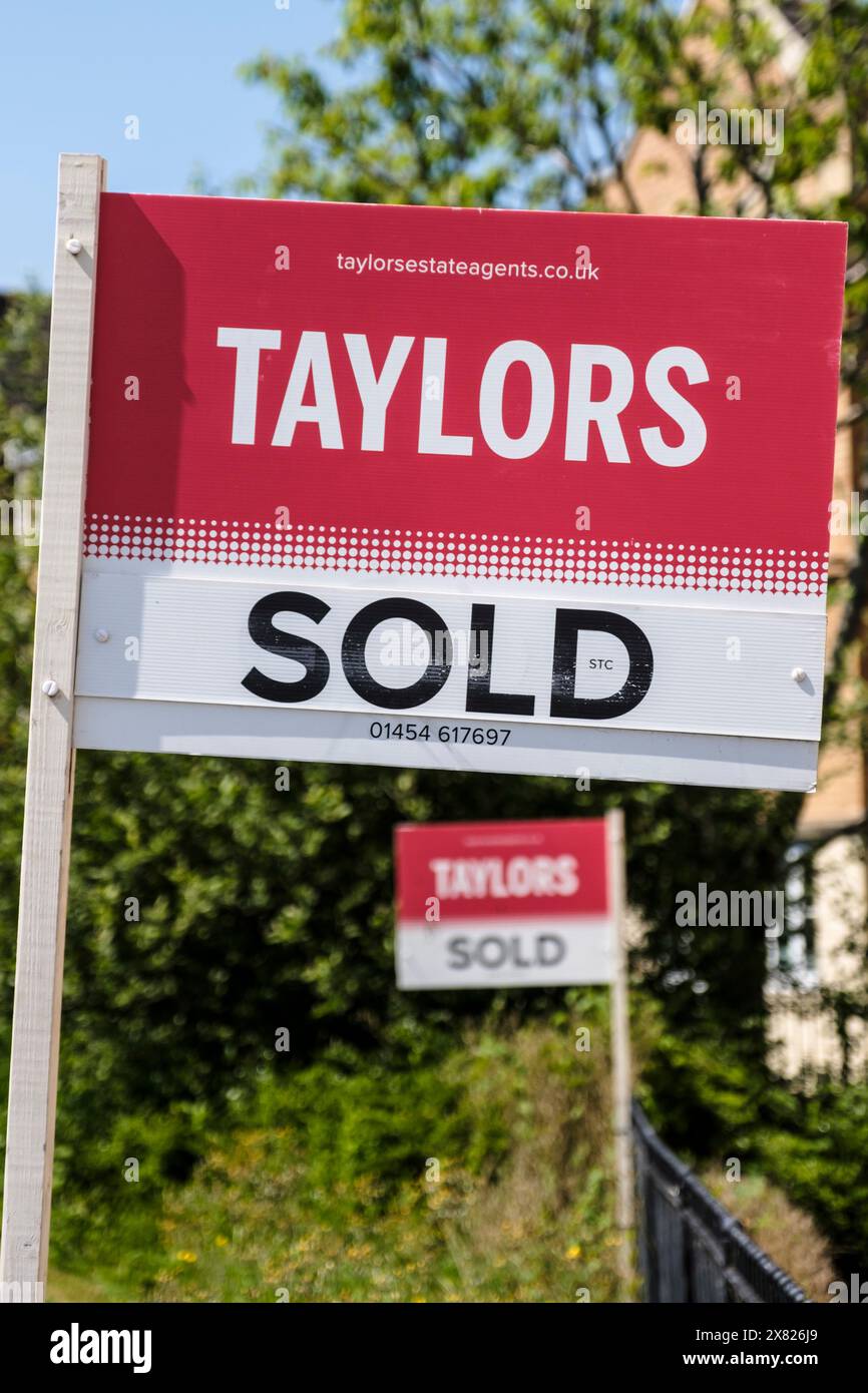 House sold sale signs in Bradley stoke South Glos UK Stock Photo - Alamy