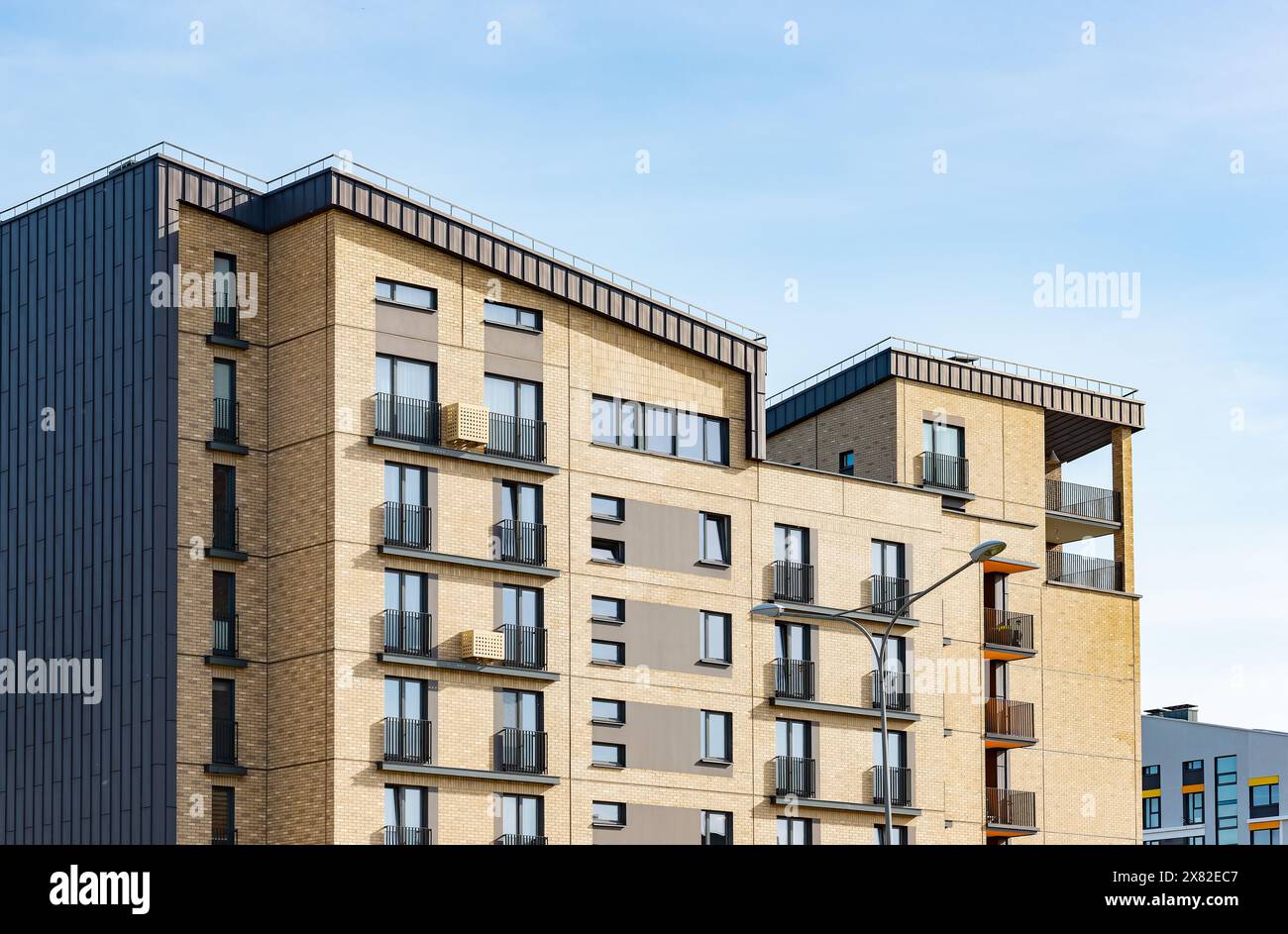 Picture of Luxury modern residential condominium, urban environment with blue sky ...
