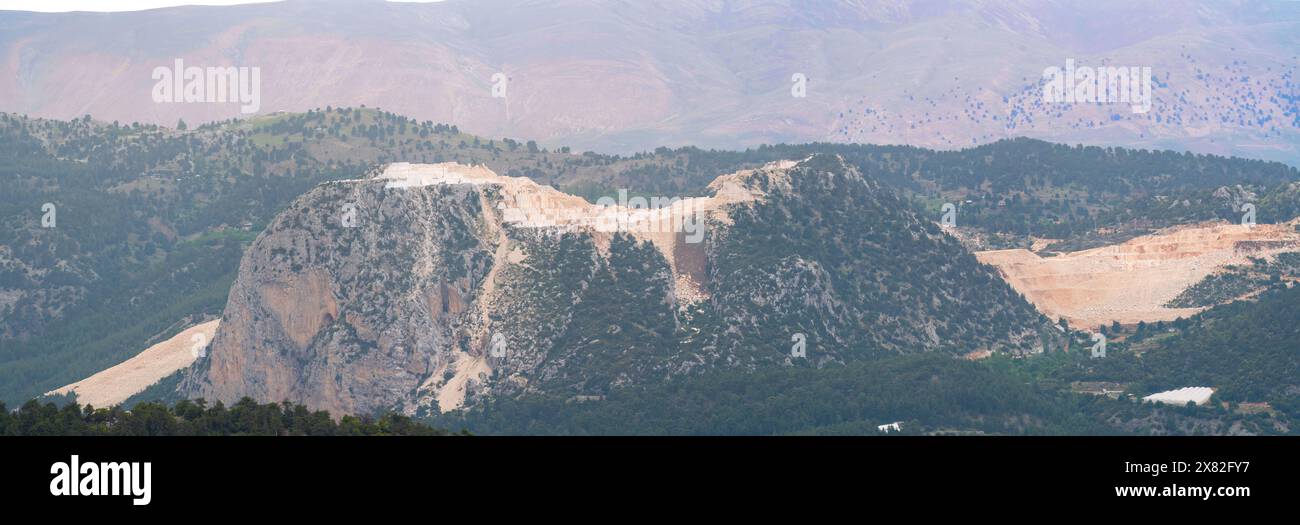 Marble quarries in the Taurus Mountains of Antalya Turkey. Damage to nature Stock Photo