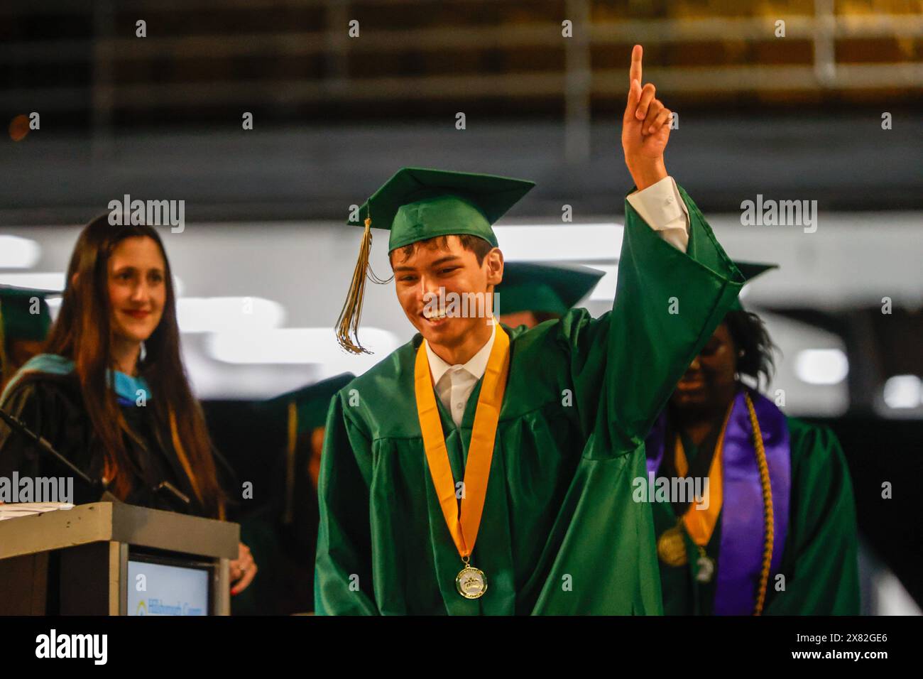 Tampa, Florida, USA. 22nd May, 2024. Graduate David Moreira celebrates when he walks the stage to receive his diploma during Chamberlain High School's graduation ceremony at the Florida State Fairgrounds Expo Hall on Wednesday, May 22, 2024, in Tampa. (Credit Image: © Jefferee Woo/Tampa Bay Times via ZUMA Press Wire) EDITORIAL USAGE ONLY! Not for Commercial USAGE! Stock Photo